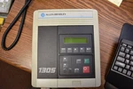 Allen Bradley Ac Frequency Drive 1305-BA03A / Programming Terminal 1201-HA2. Fixed Price $200.00.